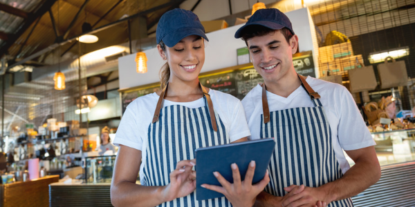 Image of restaurant staff using mobile device
